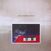 Jan Garbarek, Photo with Blue Sky, White Cloud, Wires, Windows and a Red Roof